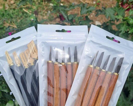 Artisan carving bamboo qalam for Arabic calligraphy using a small knife