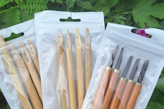 traditional reed Arabic calligraphy qalam pen held by calligrapher